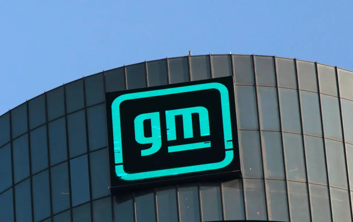 Logo of GM atop the company headquarters