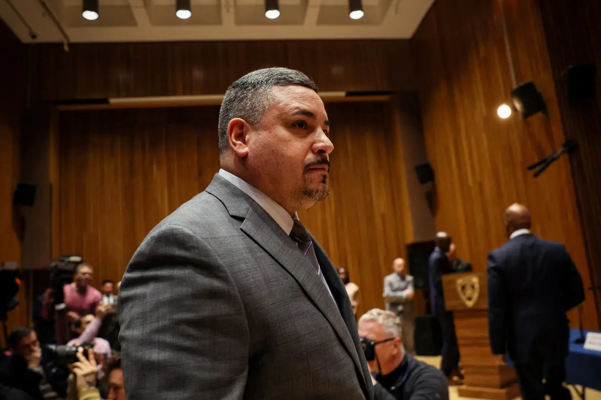 New York City Mayor Eric Adams and New York City Police Commissioner Edward Caban attend a news conference in New York