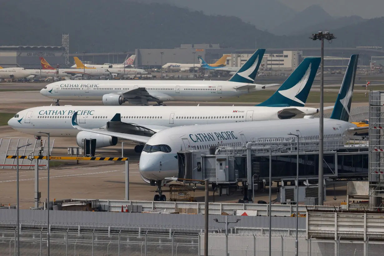 A Cathay Pacific Airbus A350 aircraft is seen in Hong Kong International Airport, in Hong Kong