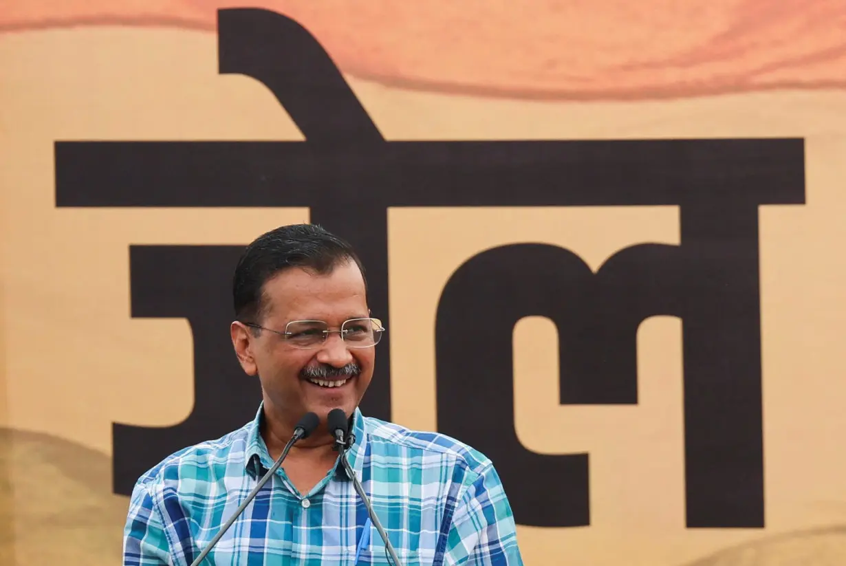 Aam Aadmi Party party members protest near Bharatiya Janata Party headquarters in New Delhi