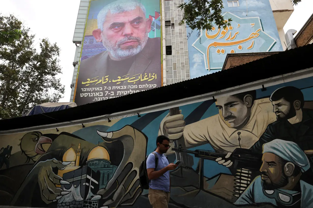 FILE PHOTO: A billboard with a picture of newly appointed Hamas leader Yahya Sinwar is displayed in Tehran