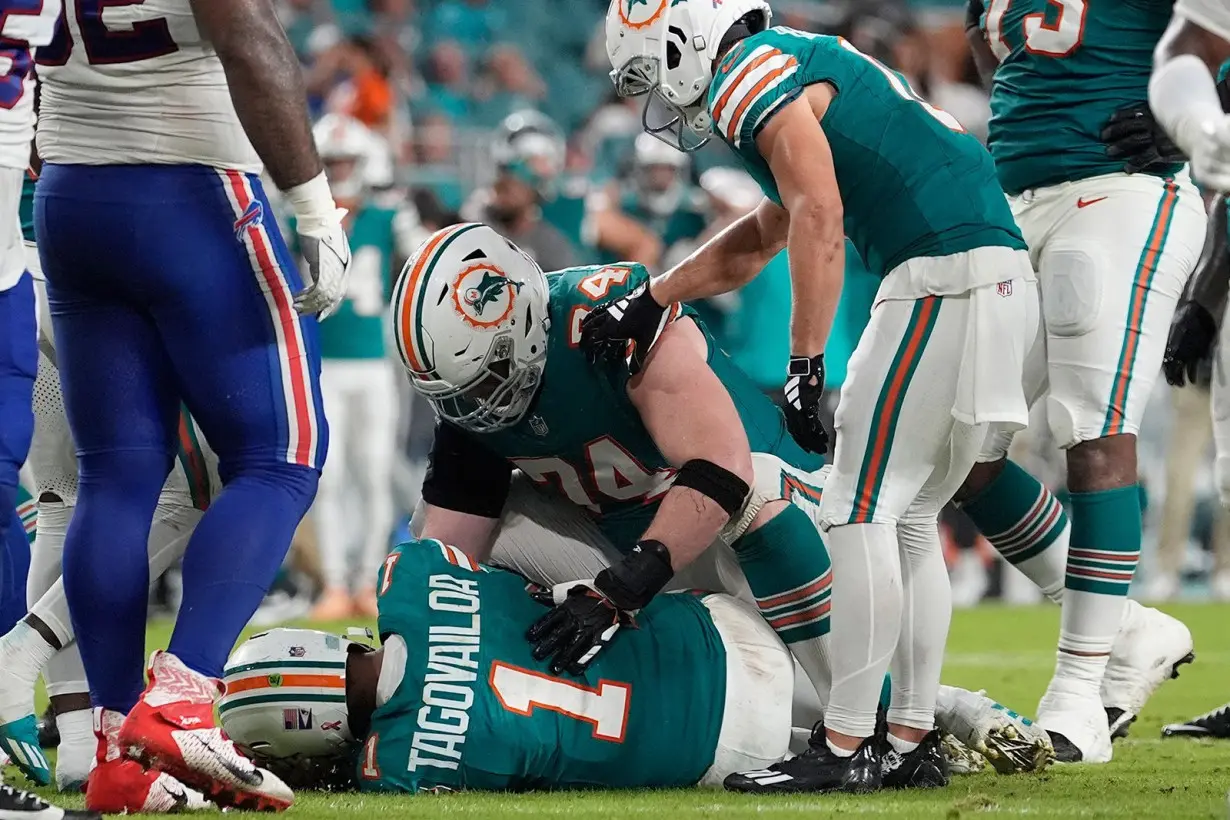 Dolphins quarterback Tua Tagovailoa suffers concussion after collision with Damar Hamlin in loss to Bills