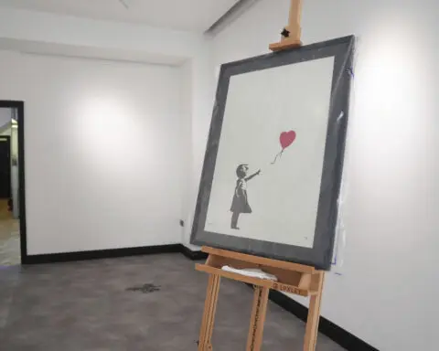 2 men are charged with stealing a famous Banksy artwork from a London gallery