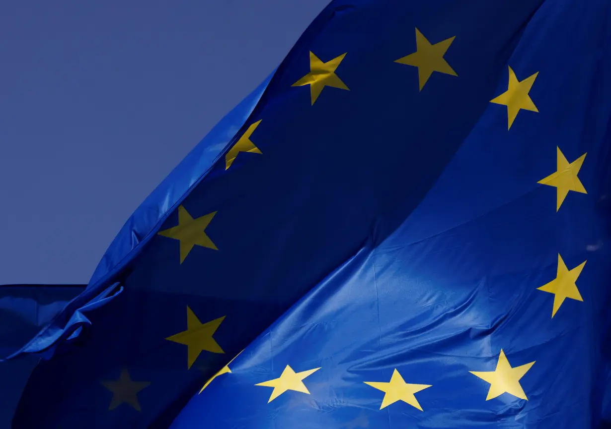 European Union flags flutter outside the EU Commission headquarters in Brussels