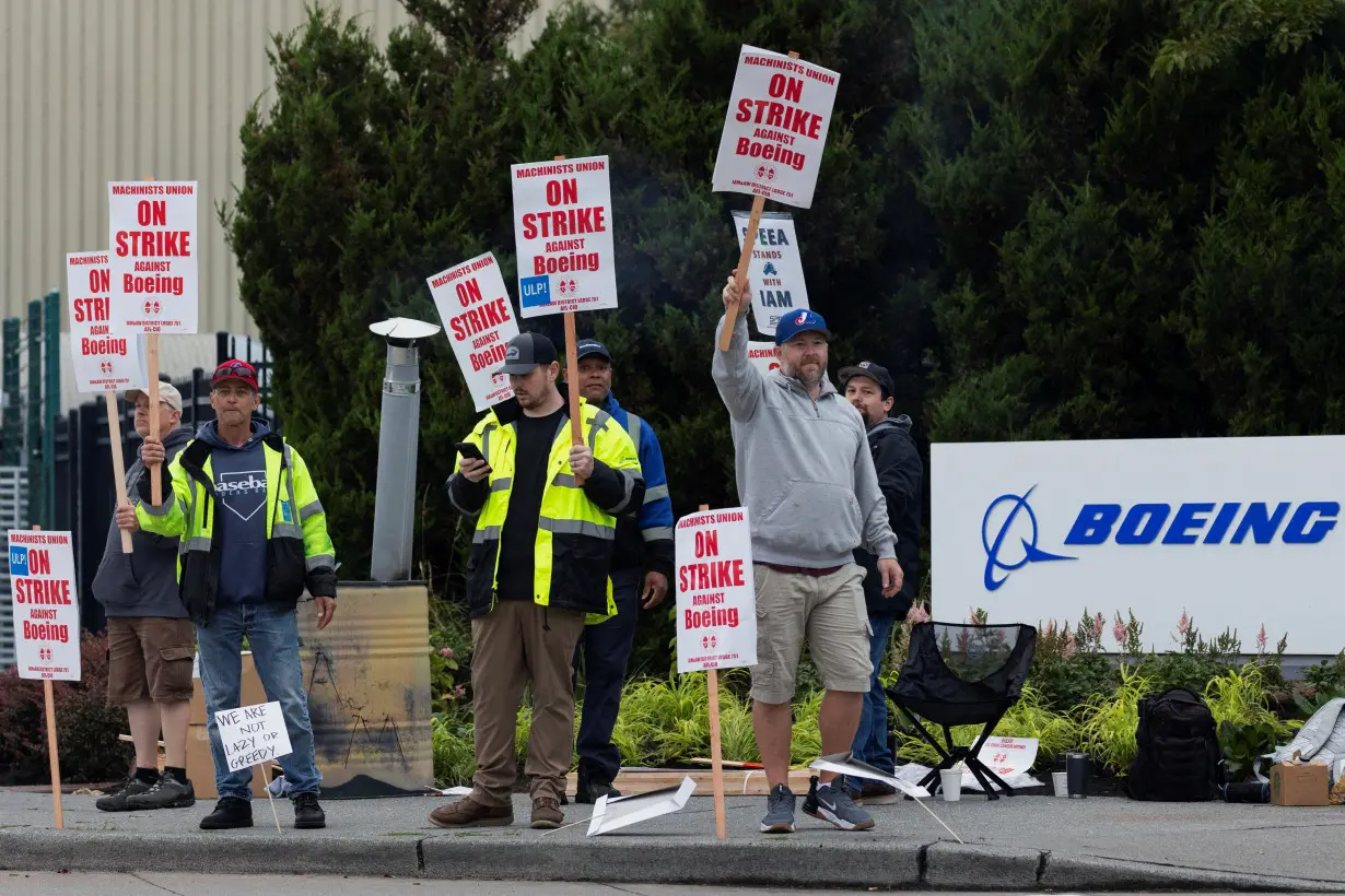 Boeing factory workers gather on picket lines in Washington state on first day of strike