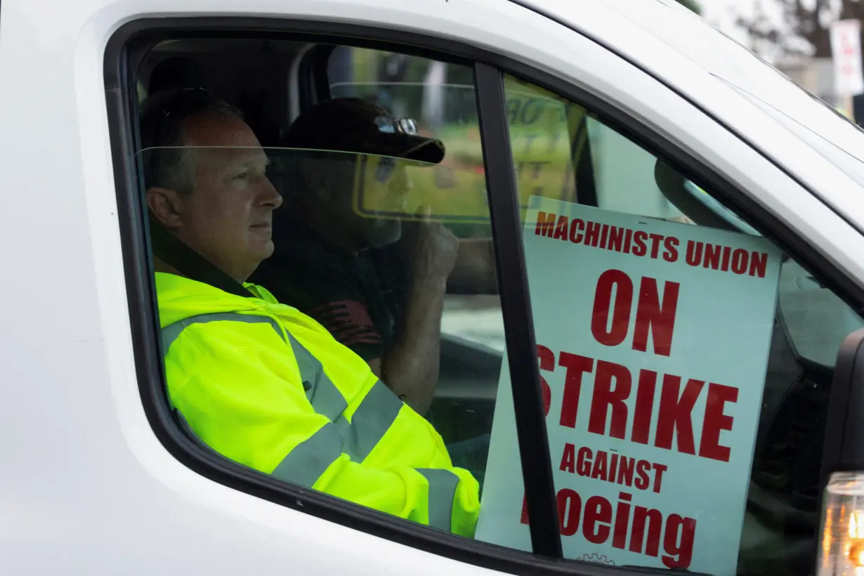 Boeing factory workers gather on picket lines in Washington state on first day of strike