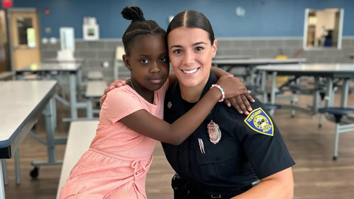 Massachusetts police officer saves child choking in school cafeteria