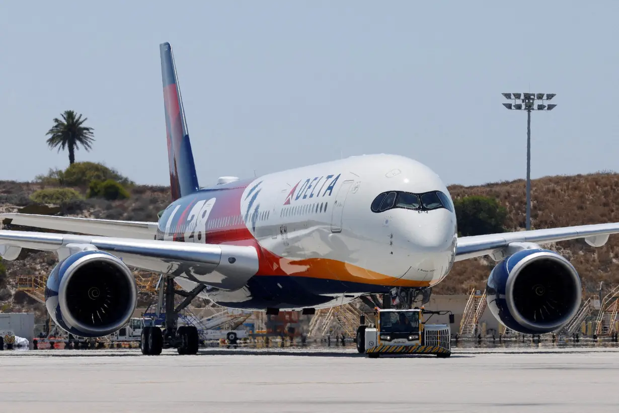 FILE PHOTO: A Delta Airlines jet arrives in Los Angeles