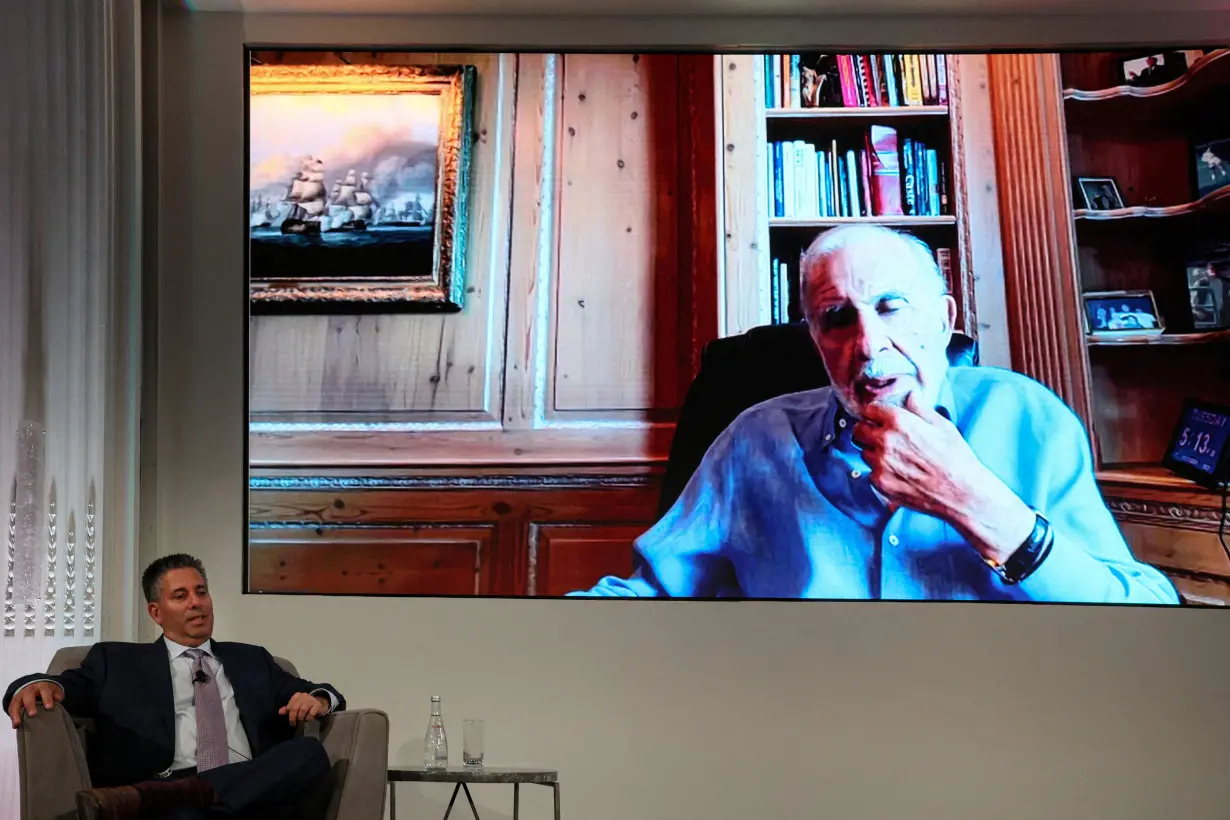 FILE PHOTO: Carl Icahn, chairman of Icahn Enterprises LP, speaks via video with Ken Squire, founder and president of 13D Monitor, during the 13D Monitor's Active-Passive Investor Summit in New York