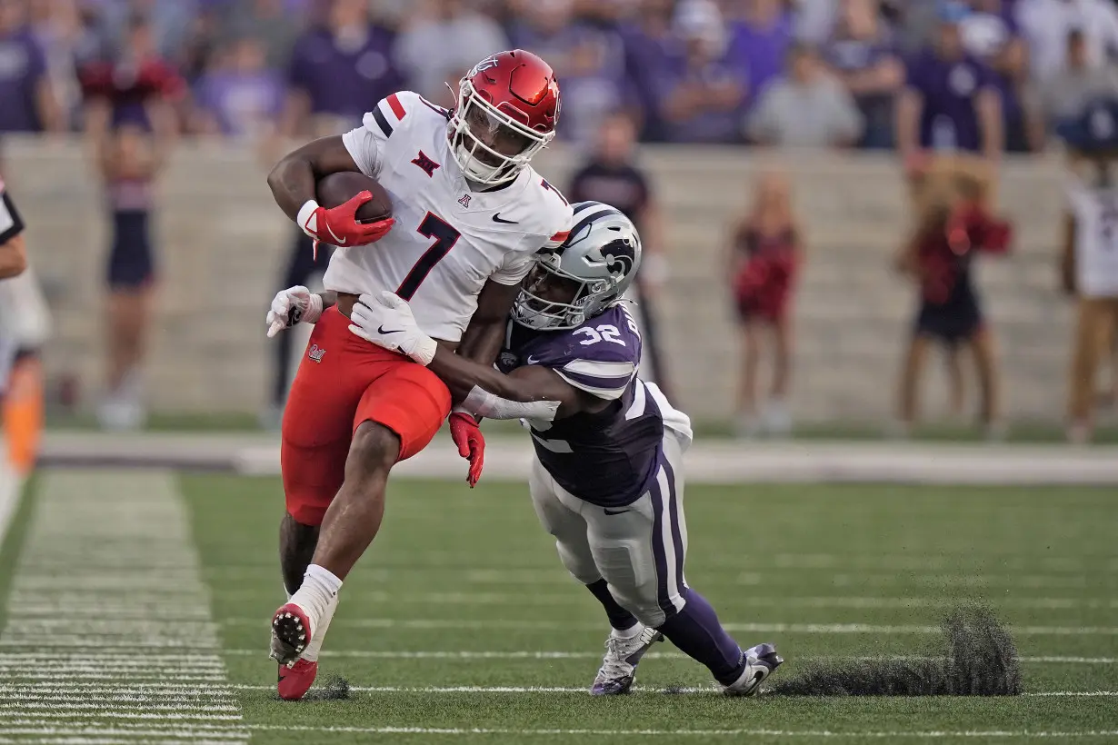 Avery Johnson helps No. 14 K-State dump No. 20 Arizona 31-7 in nonconference matchup of Big 12 foes