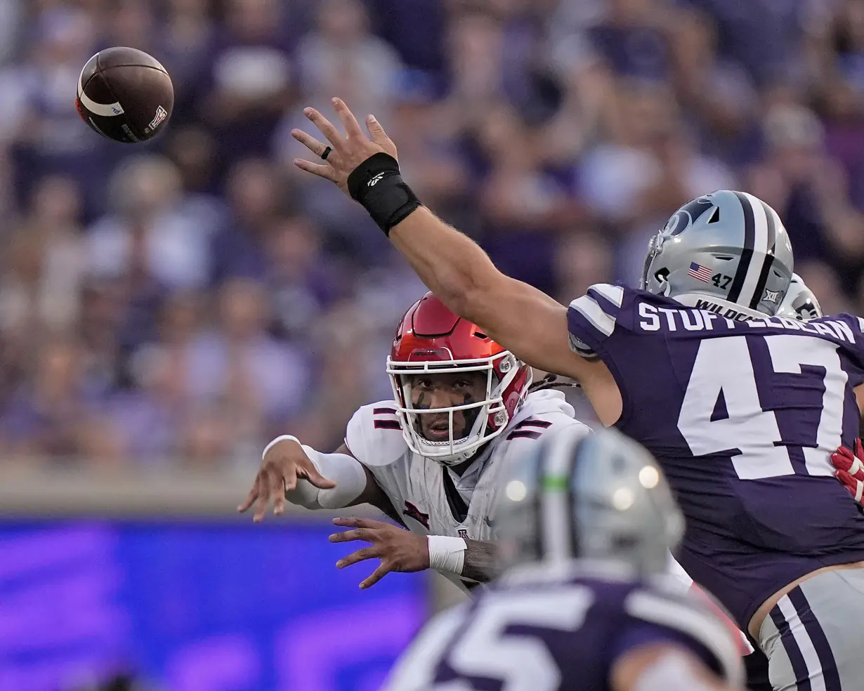 Avery Johnson helps No. 14 K-State dump No. 20 Arizona 31-7 in nonconference matchup of Big 12 foes