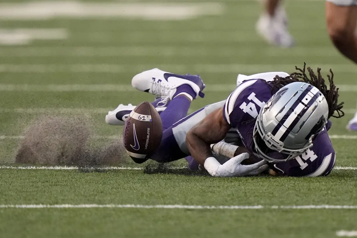 Avery Johnson helps No. 14 K-State dump No. 20 Arizona 31-7 in nonconference matchup of Big 12 foes