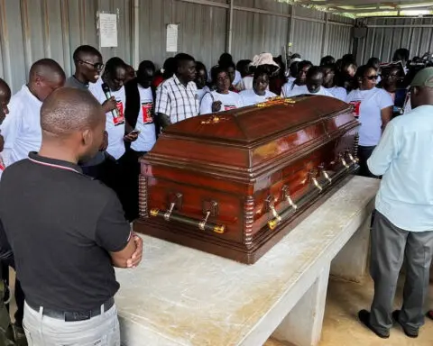 Slain Ugandan Olympian buried with full military honours