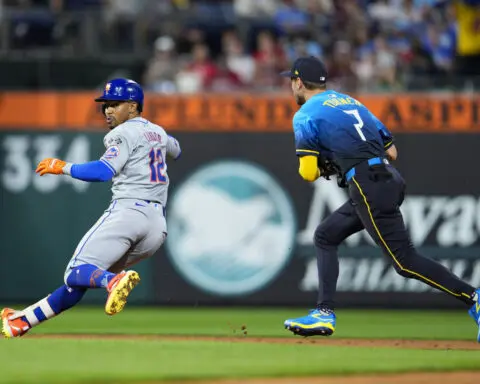 Alvarez, Nimmo, Bader hit 3 run homers to lead Mets over Phillies 11-3 for 12th win in 14 games