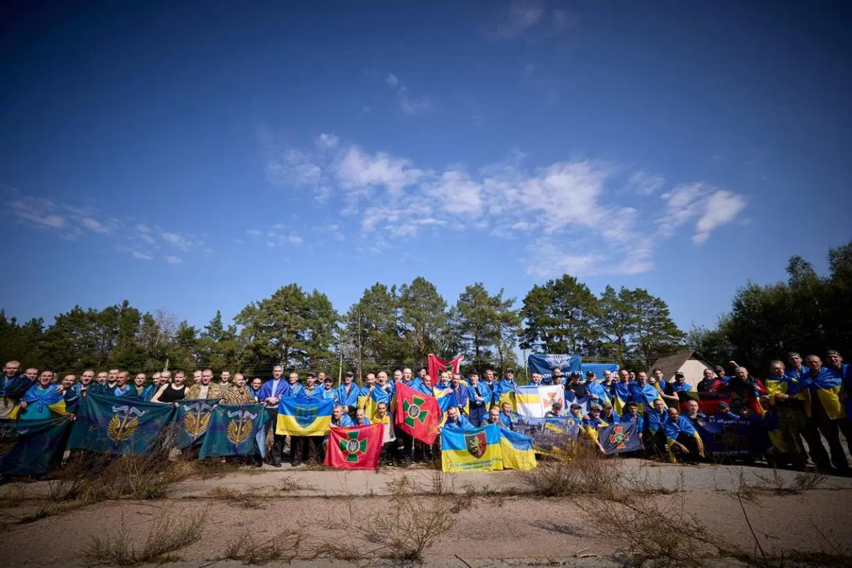 Ukrainian POWs are seen after a swap at an unknown location in Ukraine