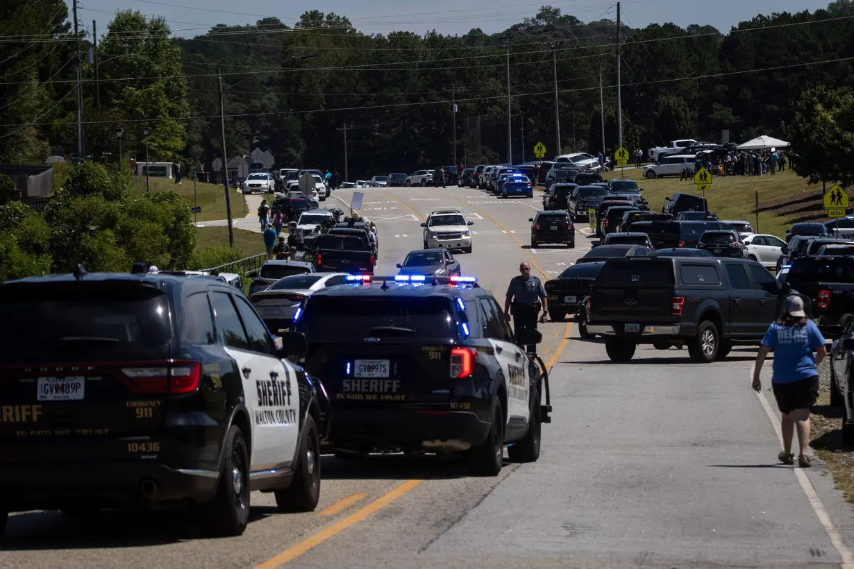 Law enforcement and first responders control traffic after a shooting took place at Apalachee High School in Winder, Georgia on September 4.