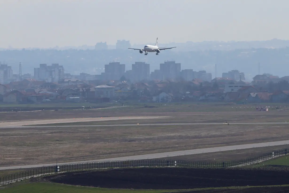 An IranAir Airbus A320 passengers aircraft prepares to land at Belgrade's Nikola Tesla Airport