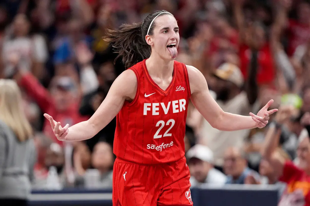 Indiana Fever's Caitlin Clark breaks WNBA single-season assists record in loss to Las Vegas Aces