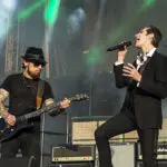 Wife of Jane's Addiction frontman says tension and animosity led to onstage scuffle