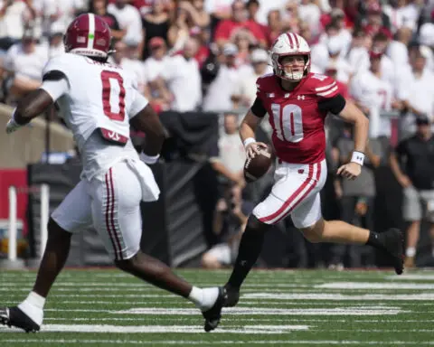 Wisconsin QB Tyler Van Dyke is knocked out of game with Alabama on the opening series