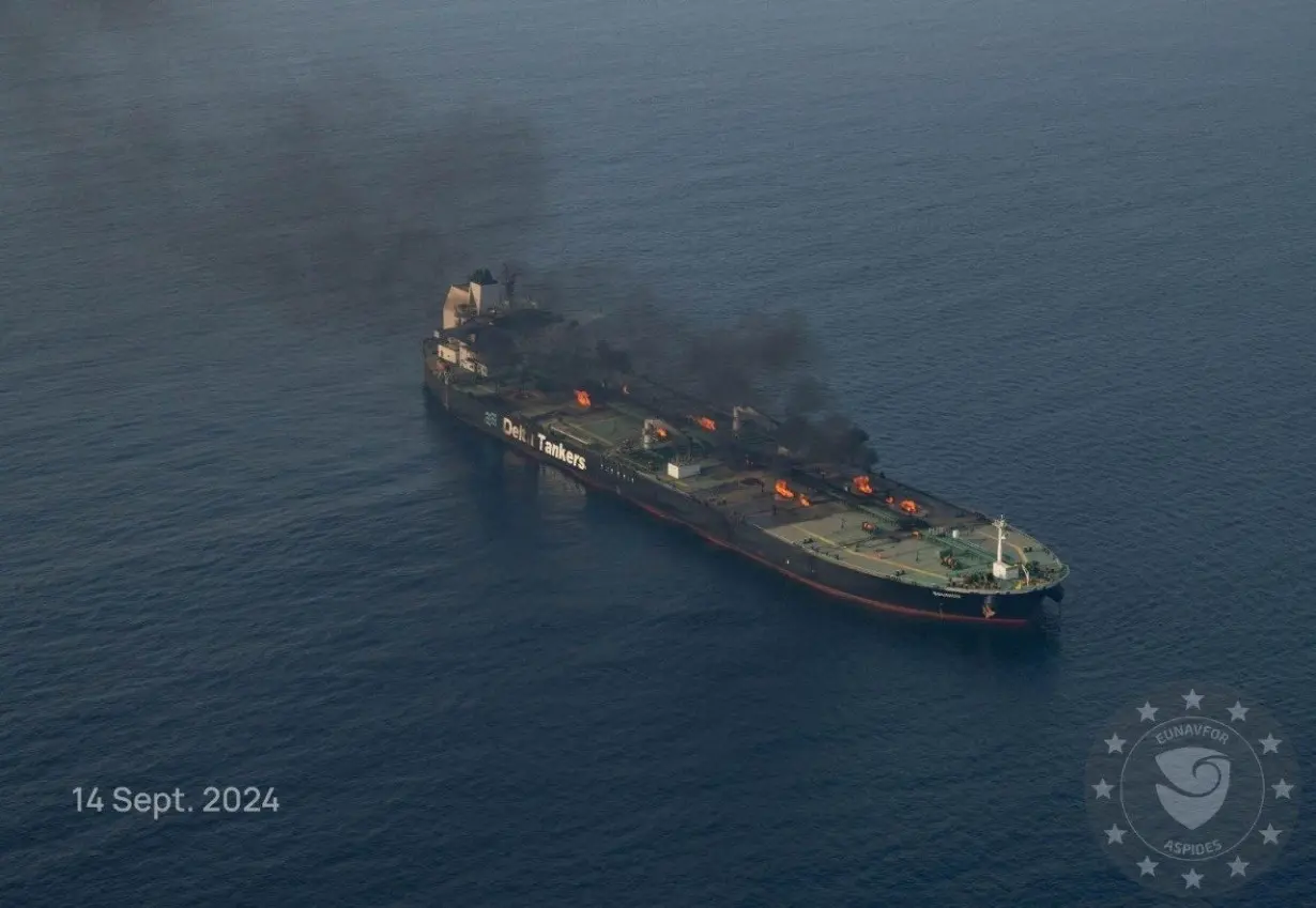 FILE PHOTO: Flames and smoke rise from the Greek-flagged oil tanker Sounion