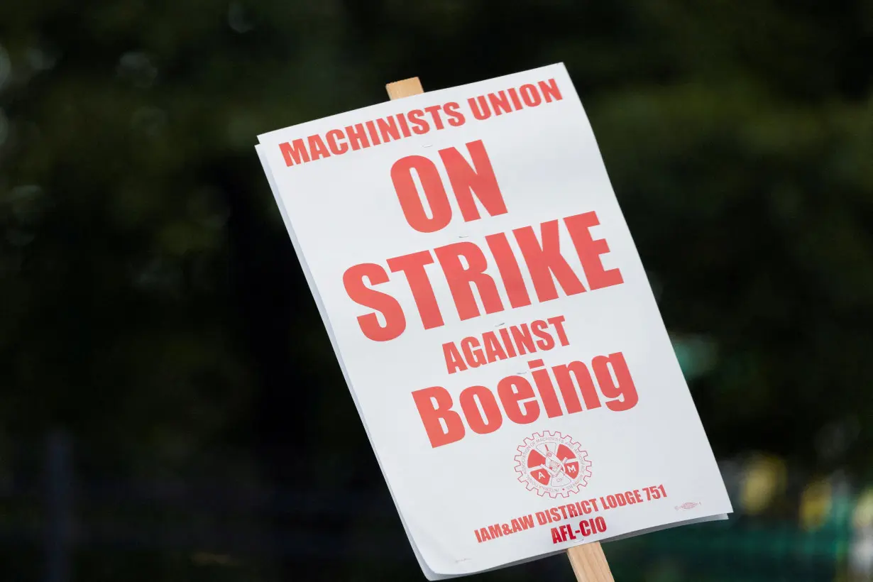 FILE PHOTO: Boeing factory workers gather on picket lines in Washington state on first day of strike