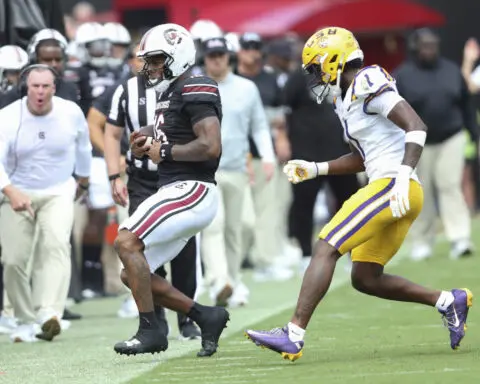 Williams' late touchdown rescues No. 16 LSU in 36-33 win at South Carolina on Saturday.