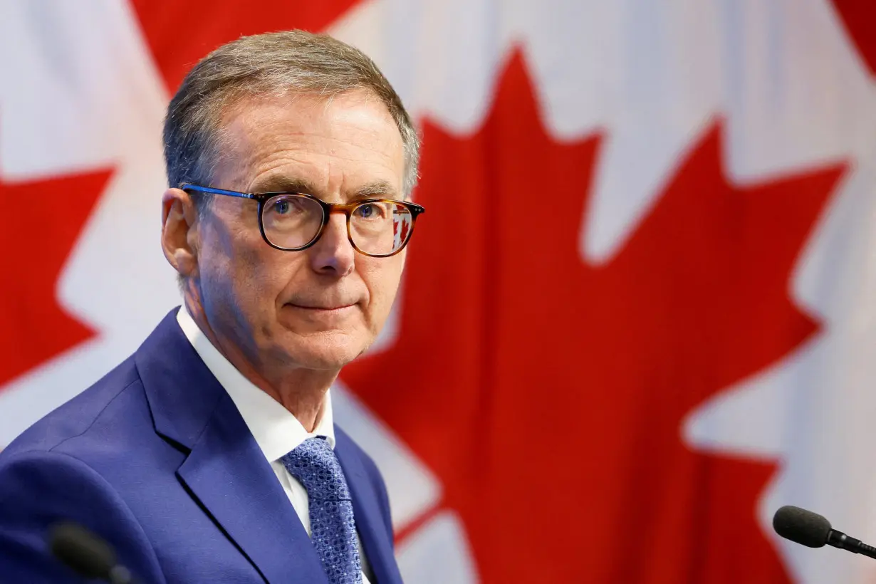 FILE PHOTO: Bank of Canada Governor Tiff Macklem takes part in a press conference in Ottawa