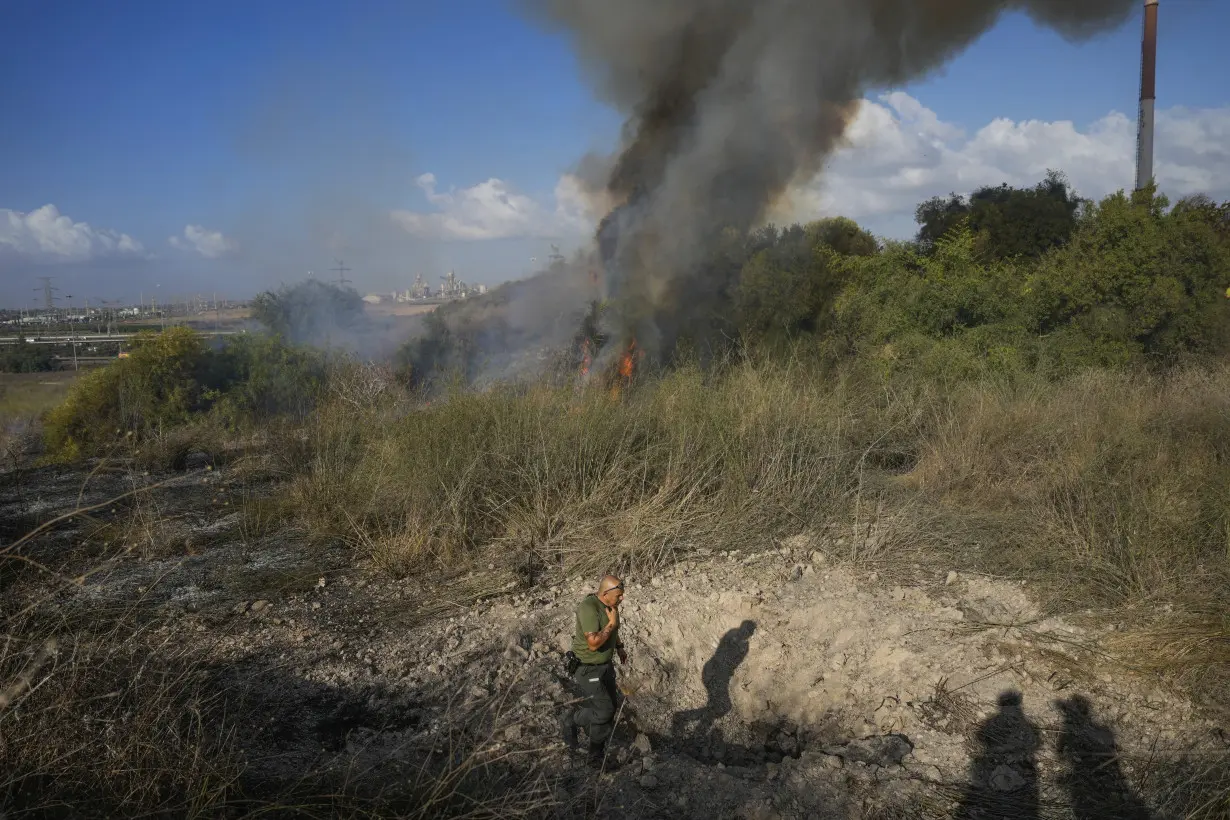 A missile fired by Yemen's rebels lands in Israel and triggers sirens at international airport