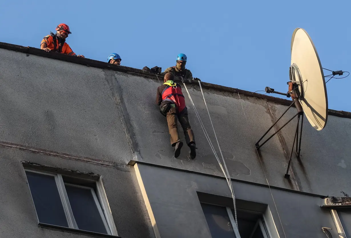 Russian bomb strikes Kharkiv apartment building, one dead, 42 injured, officials say