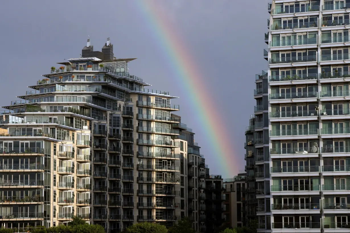 FILE PHOTO: A rainbow is seen over apartments in Wandsworth on the River Thames