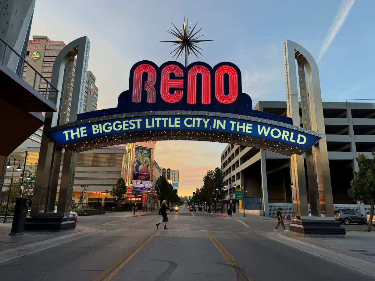 A neon sign welcomes visitors and residents to downtown in Reno