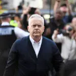 Former BBC presenter Huw Edwards gets suspended prison sentence for having indecent images of children