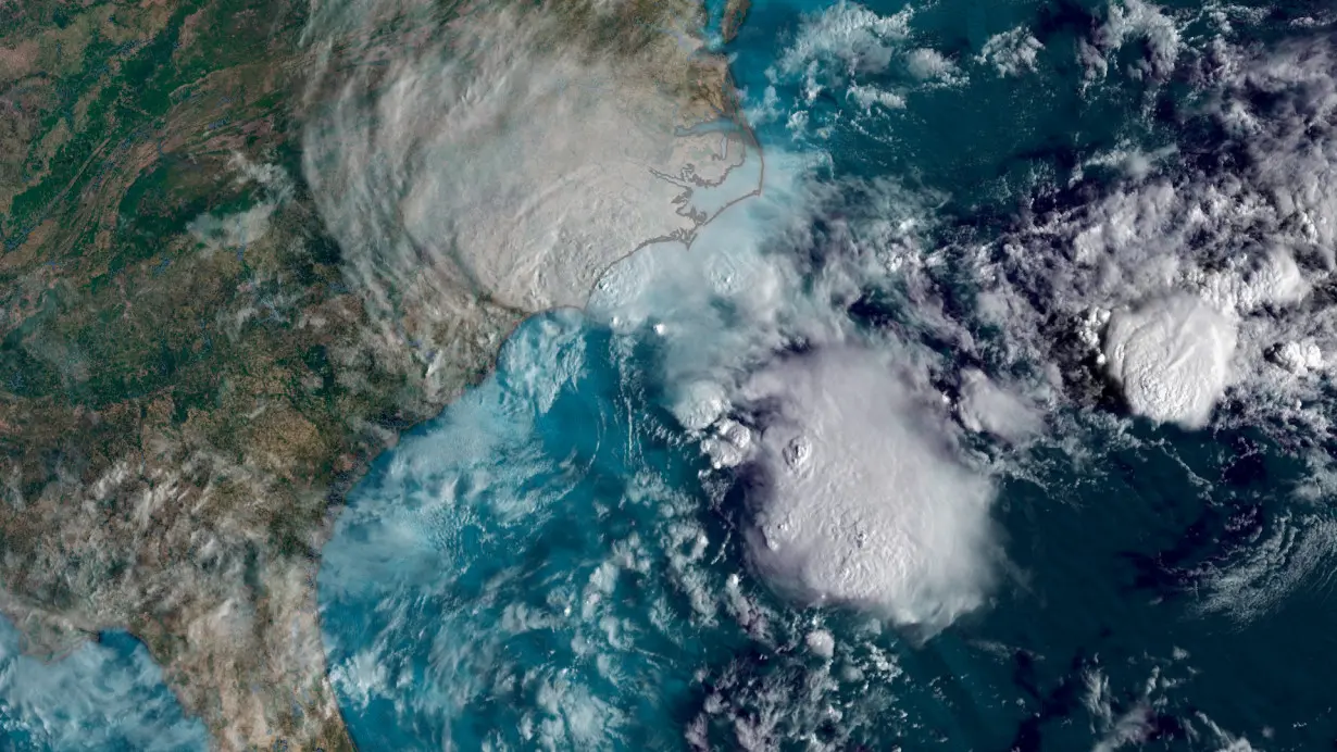 Satellite imagery shows Potential Tropical Cyclone Eight off the coast of the Carolinas Monday morning.