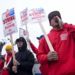 Boeing says it's considering temporary layoffs to save cash during the strike by machinists