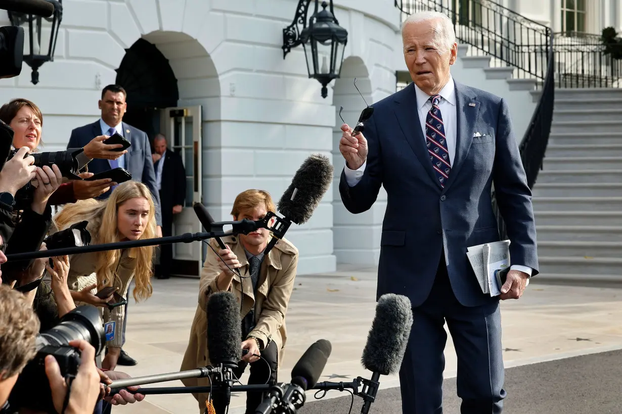 President Joe Biden talks to reporters as he departs the White House on September 16 in Washington, DC.