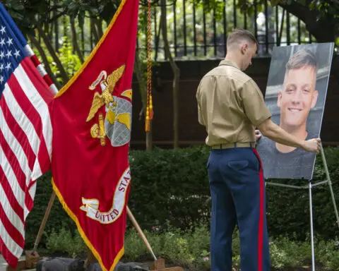 Marines give highest noncombat medal to family of Osprey crew chief who died trying to save pilots