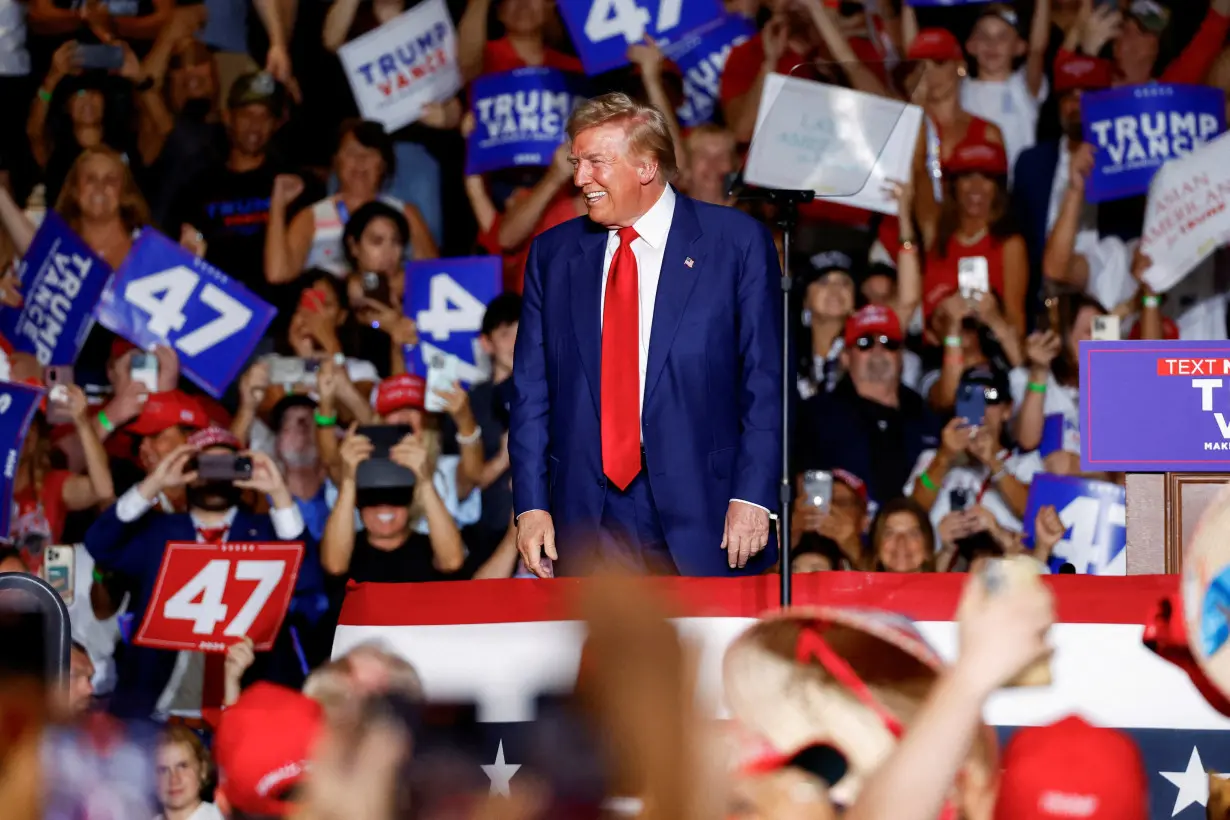 FILE PHOTO: Republican presidential nominee and former U.S. President Donald Trump holds a rally in Las Vegas