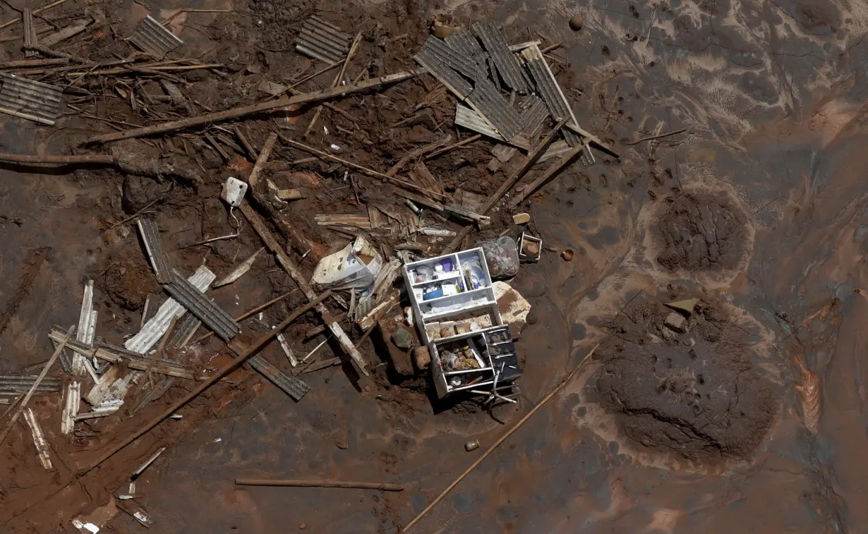 A cupboard is pictured in debris in Bento Rodrigues district, which was covered with mud after a dam owned by Vale SA and BHP Billiton Ltd burst, in Mariana