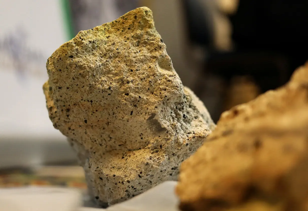 FILE PHOTO: Uranium stone is seen at a news conference of Macusani Yellowcake and Plateau Energy in Lima