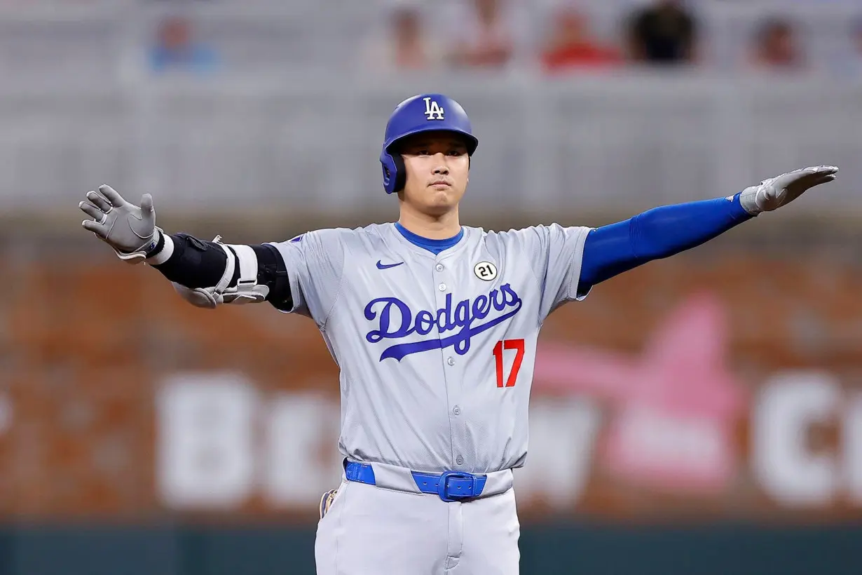 Ohtani reacts after hitting an RBI double during the fifth inning against the Atlanta Braves.