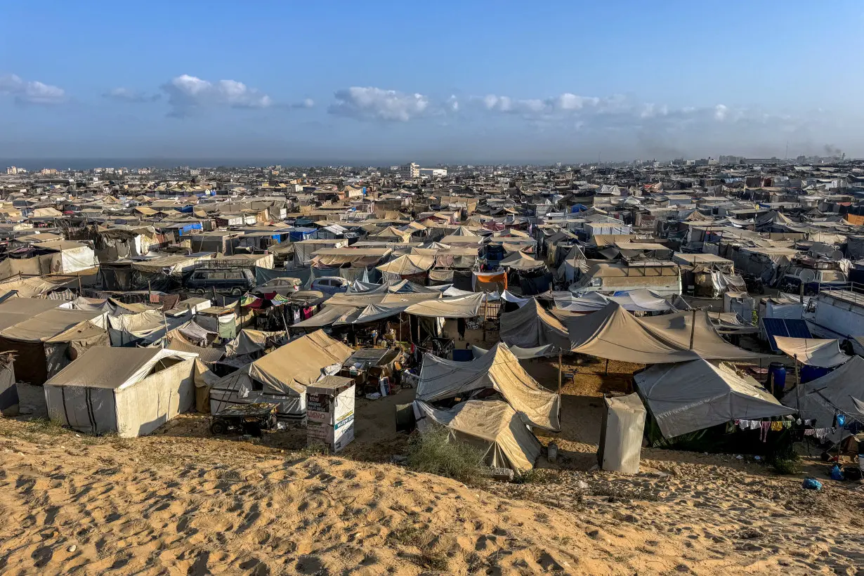 Displaced Palestinians shelter in a tent camp, amid the Israel-Hamas conflict, at the Al-Mawasi area in Khan Younis, in the southern Gaza Strip