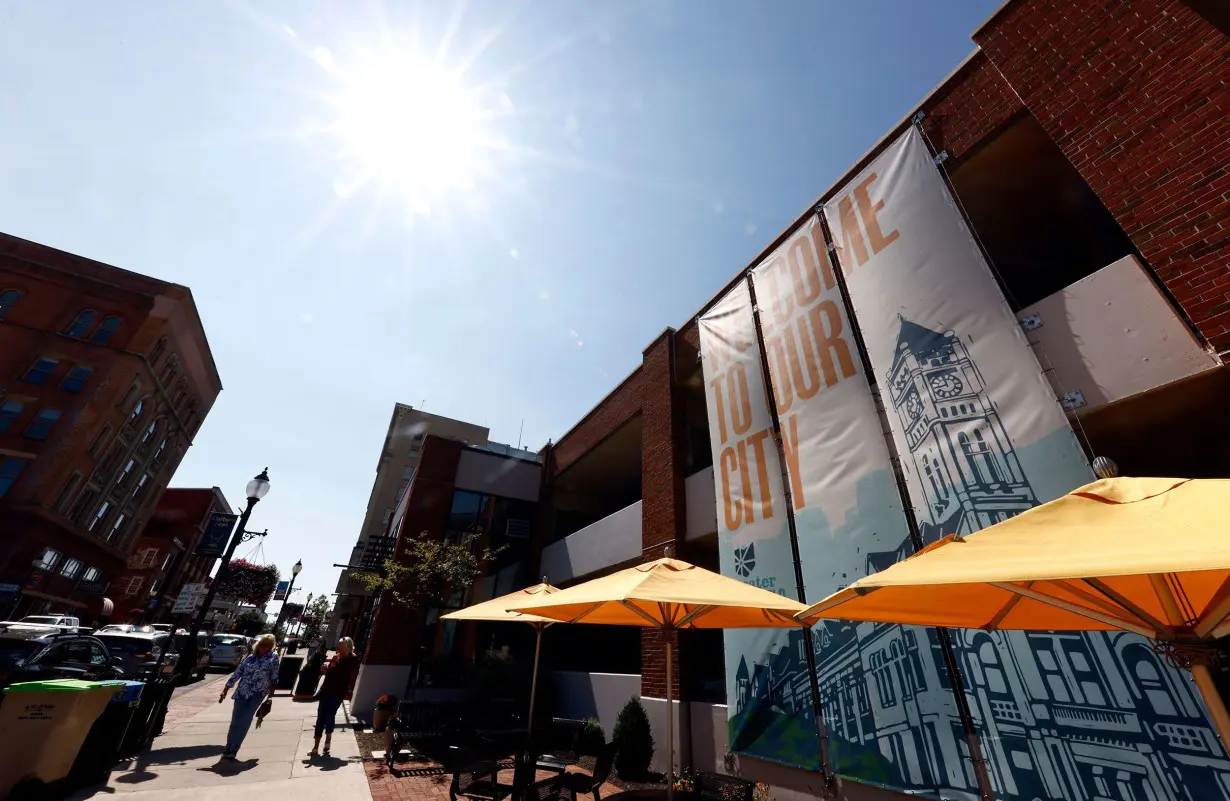 Pedestrians walk down Fountain Avenue in Springfield, Ohio, on Sept. 11.