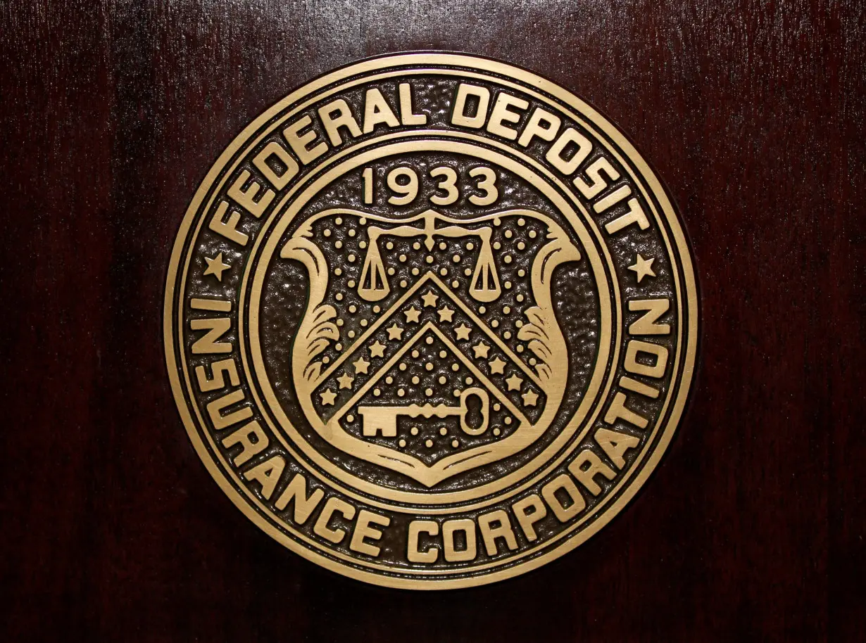 FILE PHOTO: The Federal Deposit Insurance Corp (FDIC) logo is seen at the FDIC headquarters in Washington