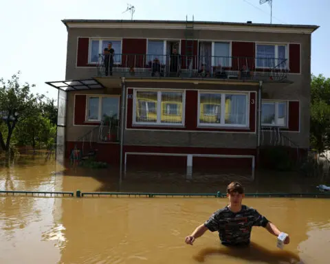 Central European floods leave trail of devastation; new areas to evacuate