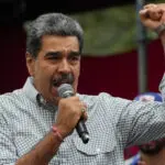 Venezuela's government says fourth US citizen was detained in alleged plot to kill President Maduro