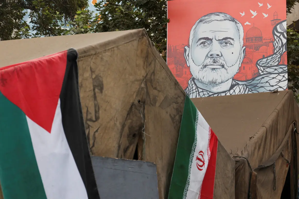 FILE PHOTO: A banner with a picture of late Hamas leader Ismail Haniyeh is displayed in Tehran