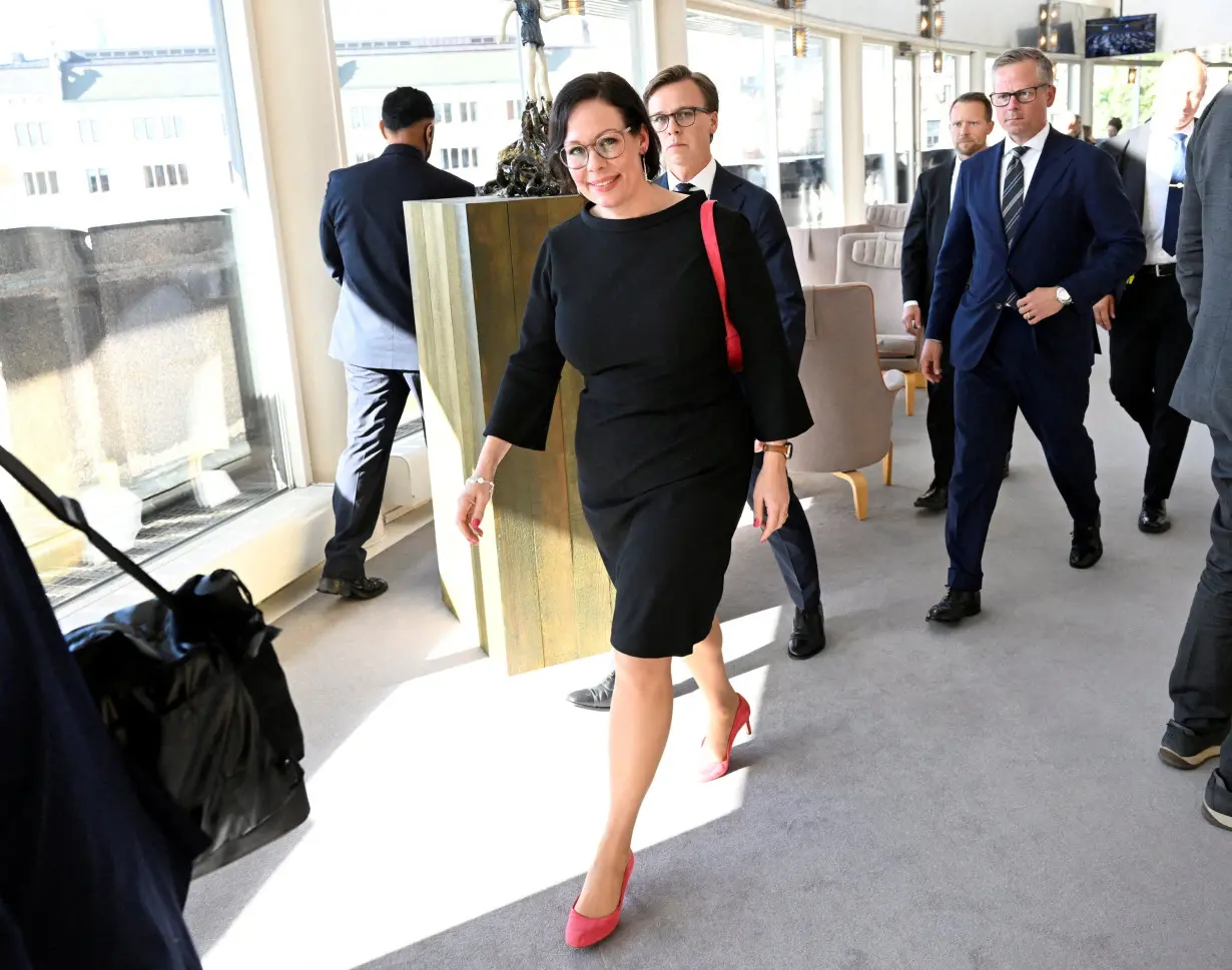 Sweden's new foreign minister Maria Malmer Stenergard walks after the opening of the parliament (Riksdagen) in Stockholm