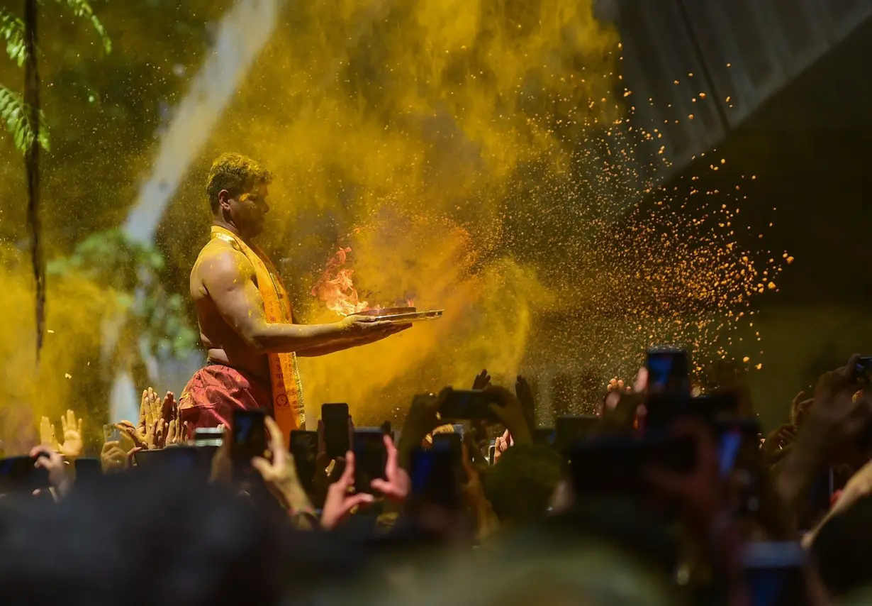 Crowds gather for rituals and celebrations during the Ganesh Chaturthi festival in Mumbai, India on September 17.