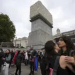 Faces of transgender people adorn an artwork in London's Trafalgar Square